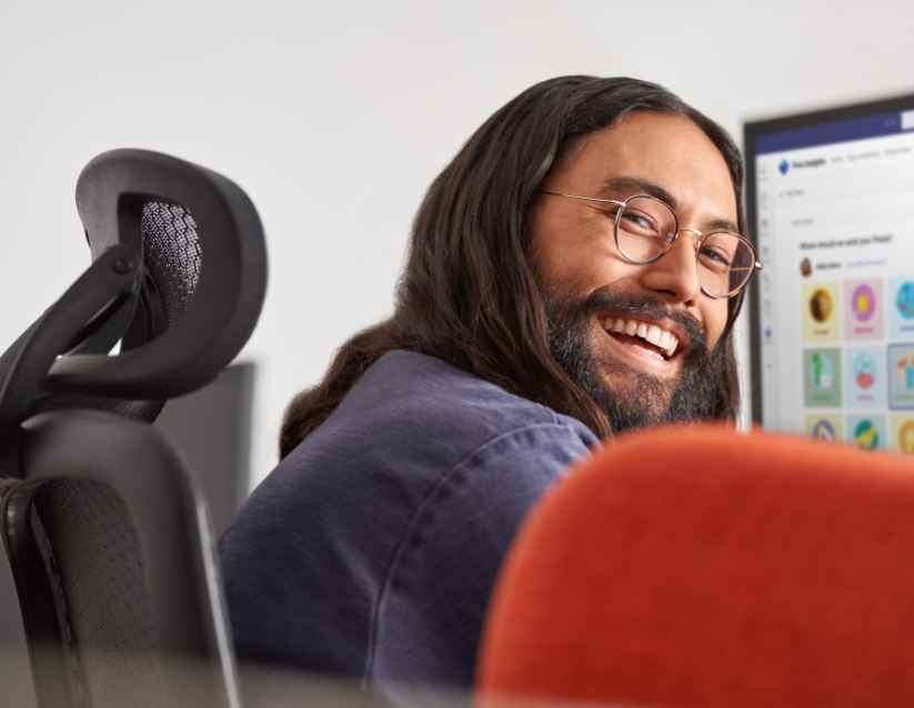 Man smiling while at work​