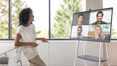 Woman having remote meeting with colleagues
