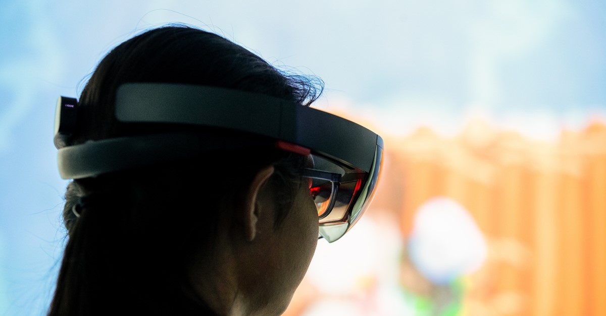 Woman using virtual headset